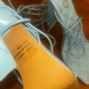 EGO-  blue lace up heels (size: US 7)